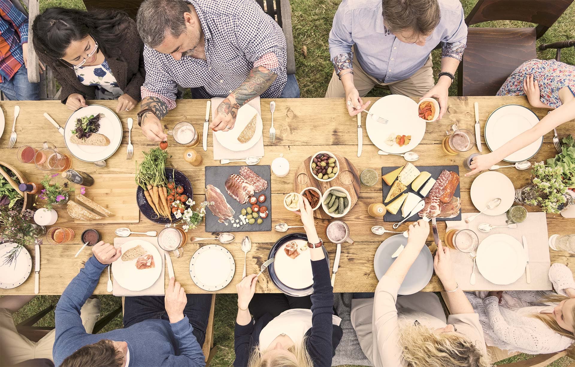 Al fresco wedding dinner table set outdoors at Pikes Peak Ranch near Woodland Park, Colorado